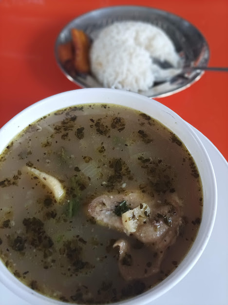 chicken soup sancocho from panama with rice bowl